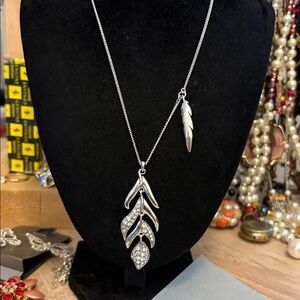 Guess feather and leaf necklace Silvertone